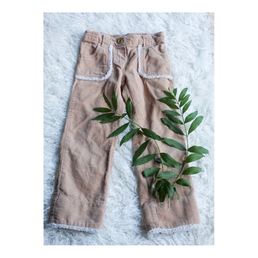 Corduroy pants with faux fur trim
